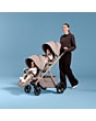 1176099110_F10_2026_maxicosi_stroller_oxfordflex_oaktruffle_momstrollerwithtwintoddlersseatmodeworldfacing