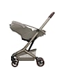 8441128110_2025_maxicosi_carseat_babycarseat_coralslidepro_brown_sapphiresand_softcarrieronstroller_side